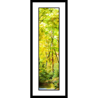 Yellow-green leaves blur together in a haze of light, obscuring their surroundings and blocking out the sky above the forest. The image of a calm pond appears at the foot of the nearest tree. Autumn Dreams by Alison Thomas of Serenity Scenes Photography and Digital Art.