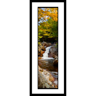A rocky waterfall tumbles from the forest to a stream below, crossed by a fallen tree trunk. Soft yellow leaves on the trees above form a canopy over the water. Autumn Flow by Alison Thomas of Serenity Scenes Photography and Digital Art.