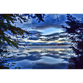 A tranquil lake at sunrise.  Clouds in the Lake by Alison Thomas of Serenity Scenes Photography and Digital Art.