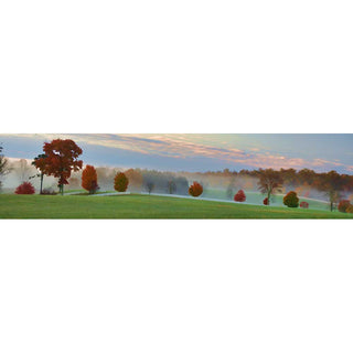 A panoramic landscape print depicting a misty autumn field with green grass, scattered red and orange trees, and a soft pink and blue sky.  Field of Orange by Alison Thomas of Serenity Scenes Photography and Digital Art.