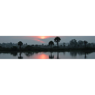 This stunning horizontal panorama features a breathtaking sunrise in sunny Florida. The vibrant pinks and blues create a striking contrast, making this slice of nature a perfect addition to any space. Bring the beauty of the Sunshine State into your home with this unique piece.  Sunrise Slice by Alison Thomas of Serenity Scenes Photography and Digital Art.