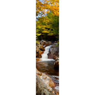 A rocky waterfall tumbles from the forest to a stream below, crossed by a fallen tree trunk. Soft yellow leaves on the trees above form a canopy over the water.  Autumn Flow by Alison Thomas of Serenity Scenes Photography and Digital Art.