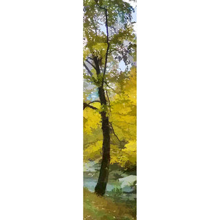 A light breeze blows through an autumn tree next to a stream. The edges of its yellow leaves blend together like watercolors, and a few have come loose and float on the wind. The tree's trunk curves, as though also moved by the air.  Yellow Wind by Alison Thomas of Serenity Scenes Photography and Digital Art